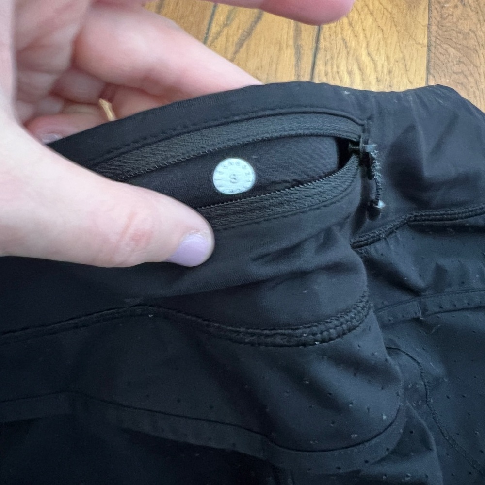 Lululemon running shorts. Size 8. Black perforated